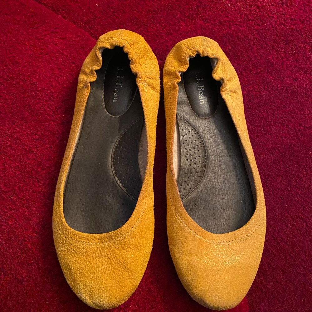 Size 7.5 leather LLBean flats. Beautiful marigold color. Light wear on heels.